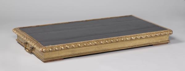 Carved and gilded foot, belonging to a lacquer chest.